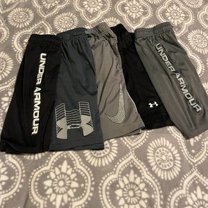 Under Armour boys 5 pairs of L shorts (4 UA and 1 Nike) great condition!